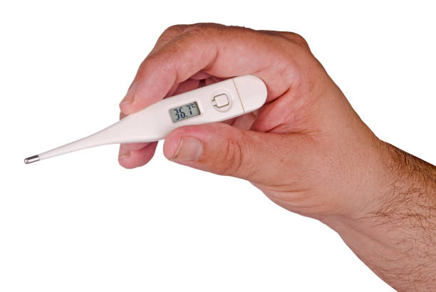 istock Medical digital thermometer in hand 1185651108