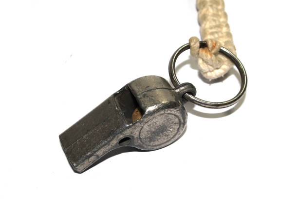istock Vintage Metal Police Man or Referee Whistle On White Background 1185652309