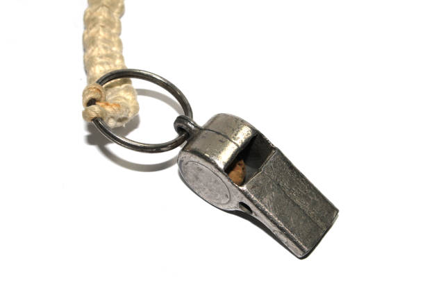 istock Vintage Metal Police Man or Referee Whistle On White Background 1185652337