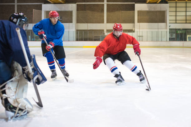 istock Hockey players playing hockey 1185654622