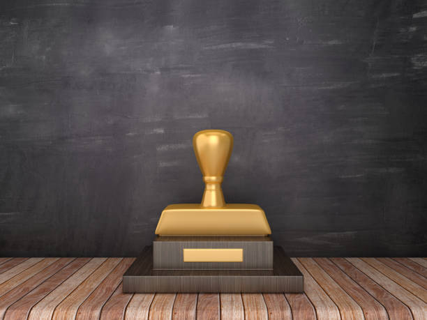 istock Trophy with Rubber Stamp on Wood Floor - Chalkboard Background - 3D Rendering 1185656053