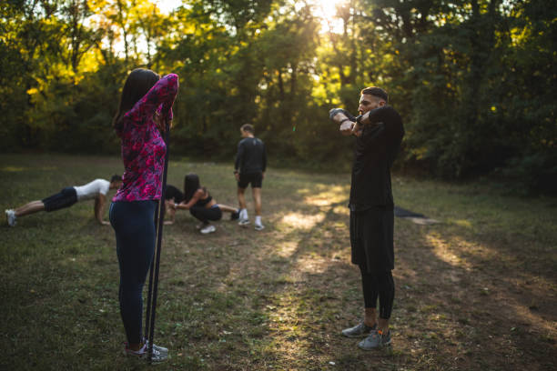 istock Group of athletes exercising outdoors 1185658345