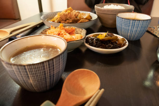 istock Chinese pork dish on table with side dishes 1185658922