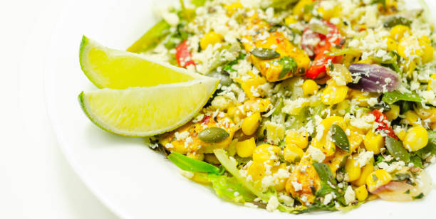 istock Moroccan style marinated chicken breast with vibrant vegetables and a fruity mango dressing 1185660062