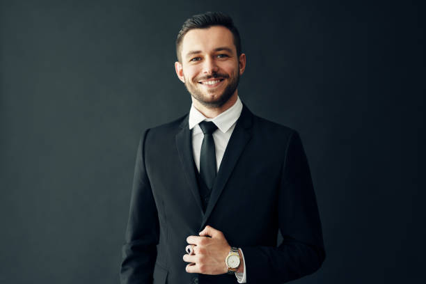 istock Happy handsome businessman in elegant suit 1185660461
