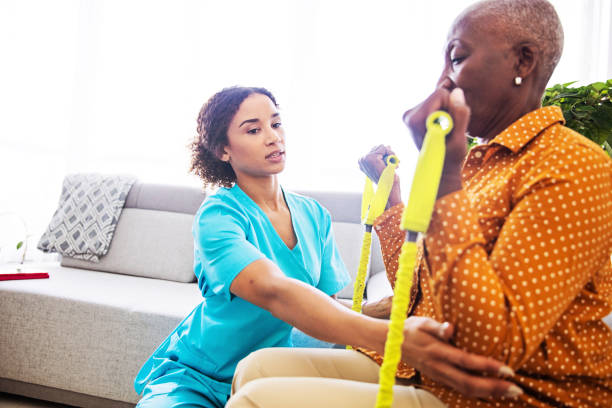 istock Home Call - Therapist With a Senior Client 1185660536