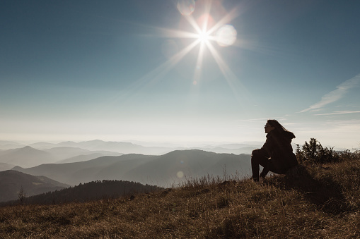 Woman on the top of the mountain, enjoying the view. Serbia, Europe