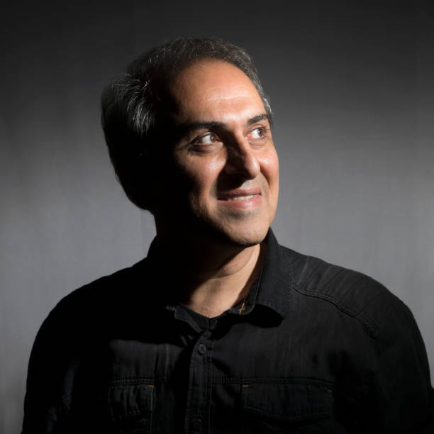 istock Portrait of smiling man 1185664891