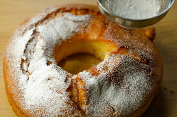 istock Madeira ring loaf cake decorated with powdered sugar from a strainer 1185667283