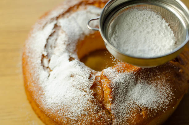 istock Madeira ring loaf cake decorated with powdered sugar from a strainer 1185667288