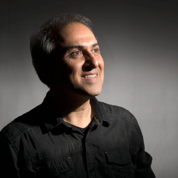 istock Portrait of smiling man 1185667868