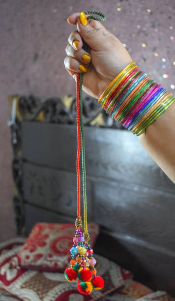 istock Hands of a girl with multi colored bangles,from Pakistan 1185669412