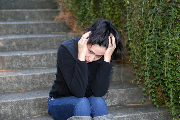 istock One woman only, sadness, depression 1185669471