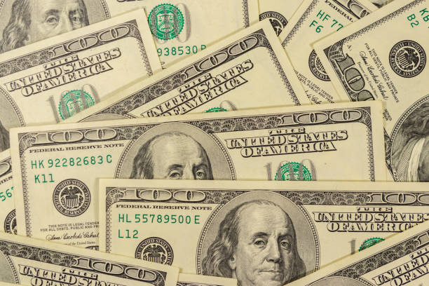 istock Background of one hundred dollar bills 1185669949