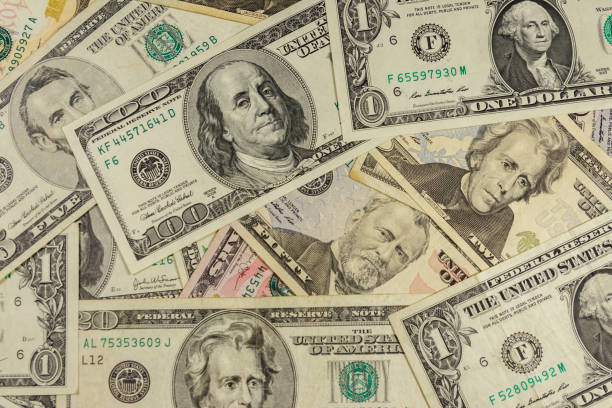 istock Background of different us dollar banknotes 1185669966