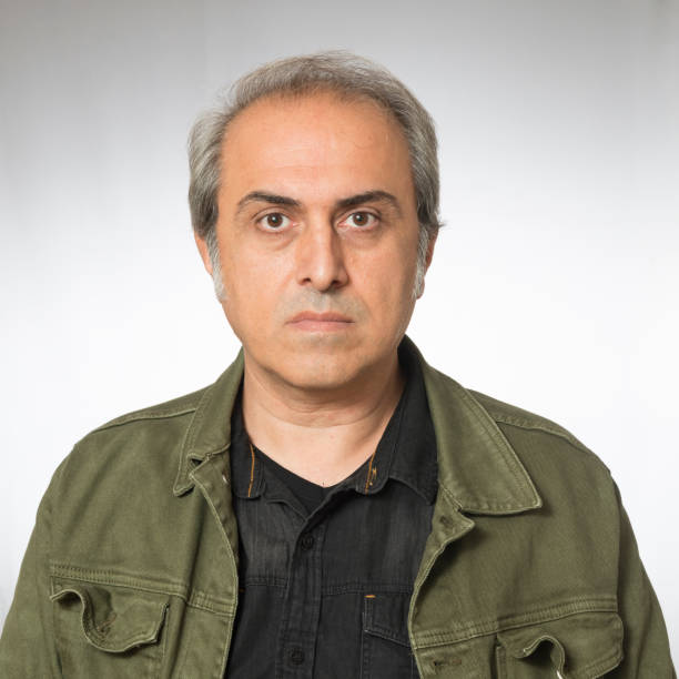 istock Portrait of serious man 1185670221