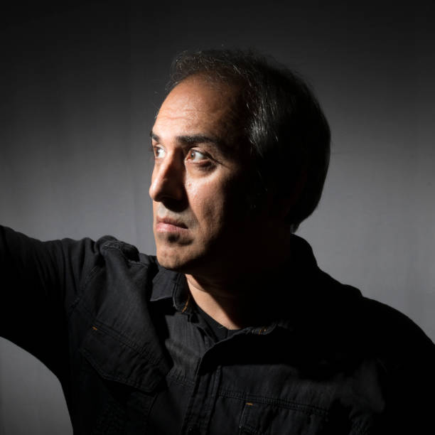 istock Portrait of serious man 1185671030