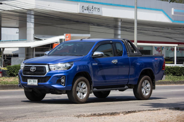 Private Pickup Truck Car Toyota Hilux Revo Chiangmai, Thailand -  October 10 2019: Private Pickup Truck Car Toyota Hilux Revo. On road no.1001, 8 km from Chiangmai city. toyota hilux stock pictures, royalty-free photos & images