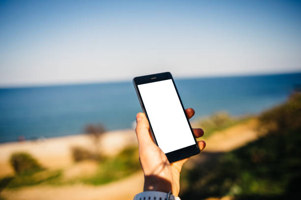 istock Close-up of a mobile phone with a blank screen 1185675066