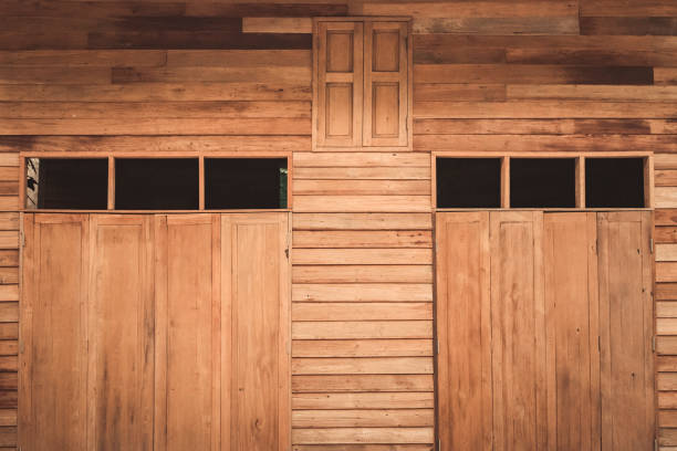 Old wooden window. With wall texture