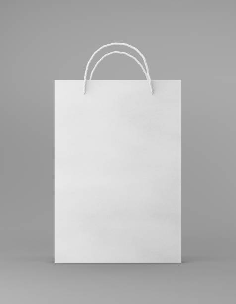 istock Eco packaging mockup bag kraft paper with handle front side. Standart medium white template on gray background promotional advertising. 3D rendering 1185676265