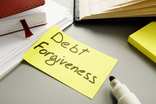 istock Business photo shows hand written text debt forgiveness 1185676687