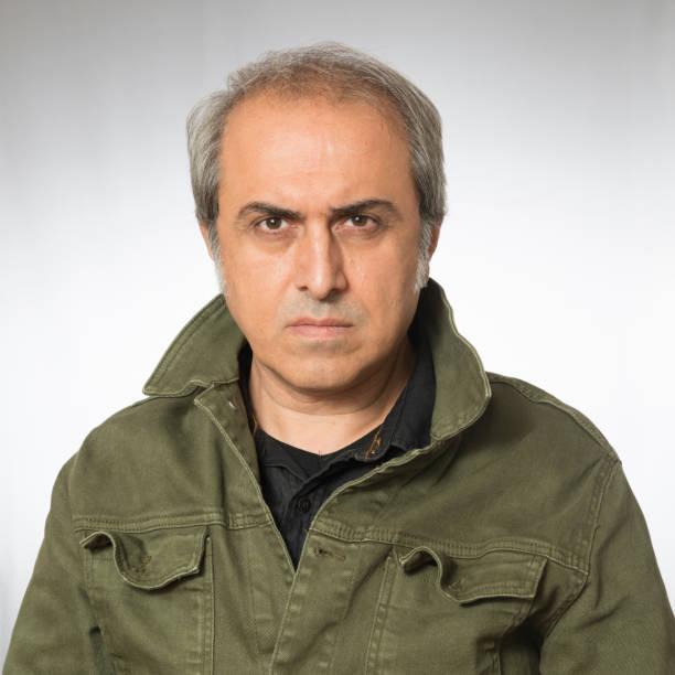 istock Portrait of serious man 1185676691