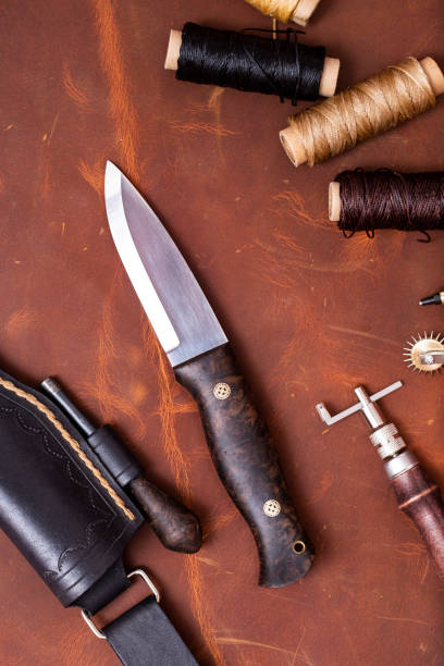 istock bushcraft knife and leather stitch 1185676969