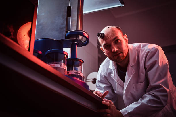istock Expirienced watchmaker is working with autoclave at his own studio 1185678614