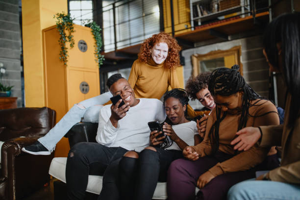 istock Roommates hanging out in apartment 1185679704