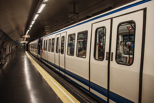 Milan, Italy - 29.11.2023: Platform in San Donato Milanese metro station. Italy national covid lockdown. Empty metro station.