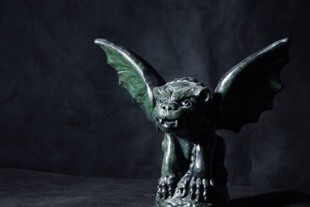 istock Gargoyle Dogs sitting with Wings spread  for Halloween 1185683811