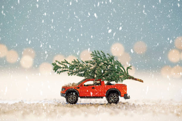 istock Toy car  with Christmas tree 1185686807