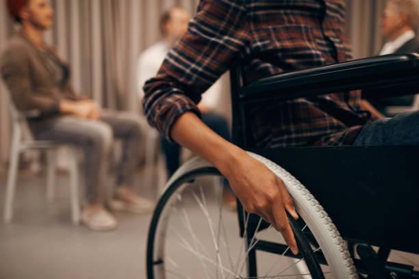 istock Disabled man in wheelchair 1185686829