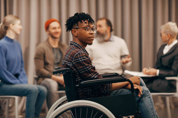 istock Young African man in wheelchair 1185687018