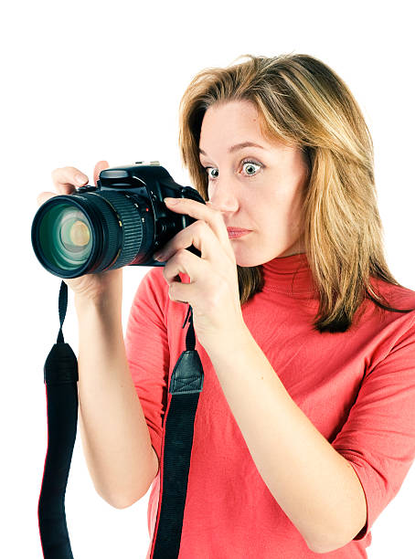 istock young girl with photocamera 118568703