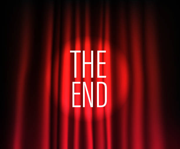 istock Theatre curtain with round spotlight. The end concept 1185693771