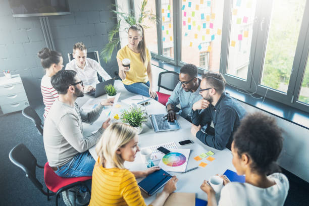 istock Young creative business people meeting at office. 1185701413