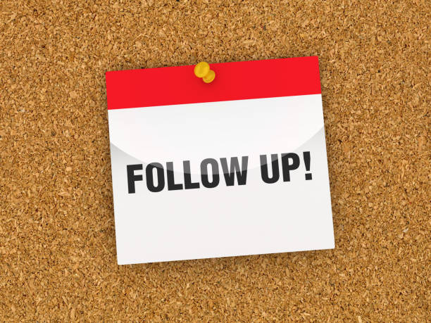 istock FOLLOW UP! Calendar on Corkboard - 3D Rendering 1185704404