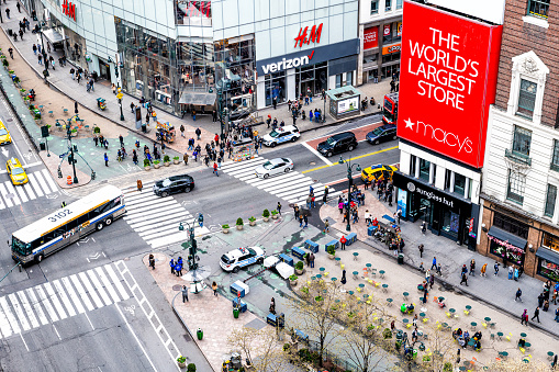 Pedestrians navigate through Downtown Toronto.