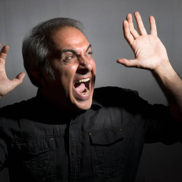 istock Shocked man wearing black shirt 1185708773