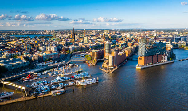 Aerial view of Hamburg Hafen City Aerial view on the Elbe river towards Elbphilharmonie at sunset elbphilharmonie photos stock pictures, royalty-free photos & images