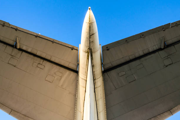 istock wings of a large airliner on a blue background 1185716686