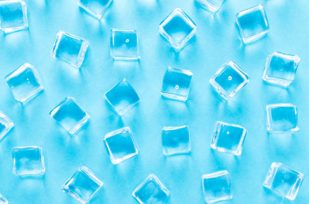 istock abstract background with ice cubes on blue background, flat lay 1185717057