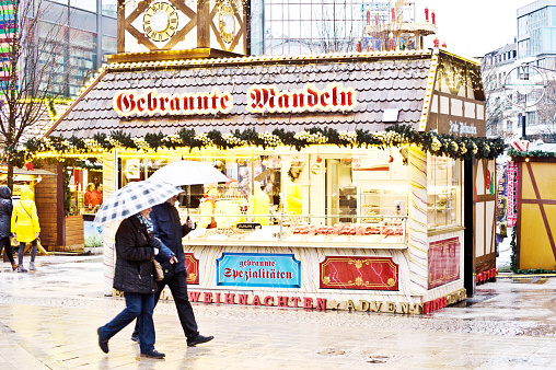 Visitors enjoying a Vienna Christmas market, Austria