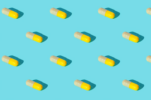 istock Pills in capsule on a green background. Set. Texture 1185723792