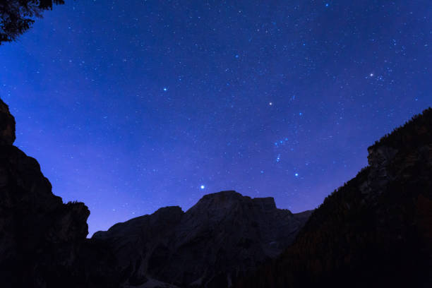 istock Night sky with stars at Dolomites mountains 1185725834