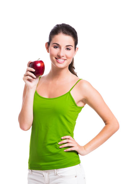 istock Healthy woman holding an apple 1185725878