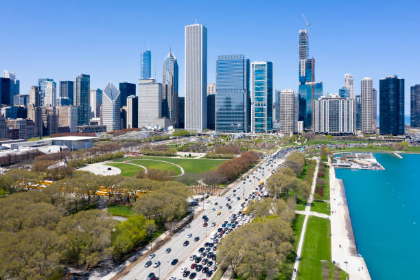 Chicago Cityscape with Grant Park, Aerial View Chicago, Illinois, cityscape with Grant Park and S Lake Shore Drive with car traffic, aerial view. grant park stock pictures, royalty-free photos & images