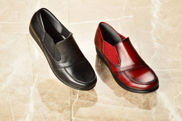 istock Women's shoes on the Marble Background 1185728846